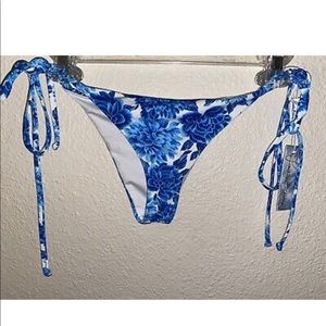 Frankie’s blue floral bikini bottoms